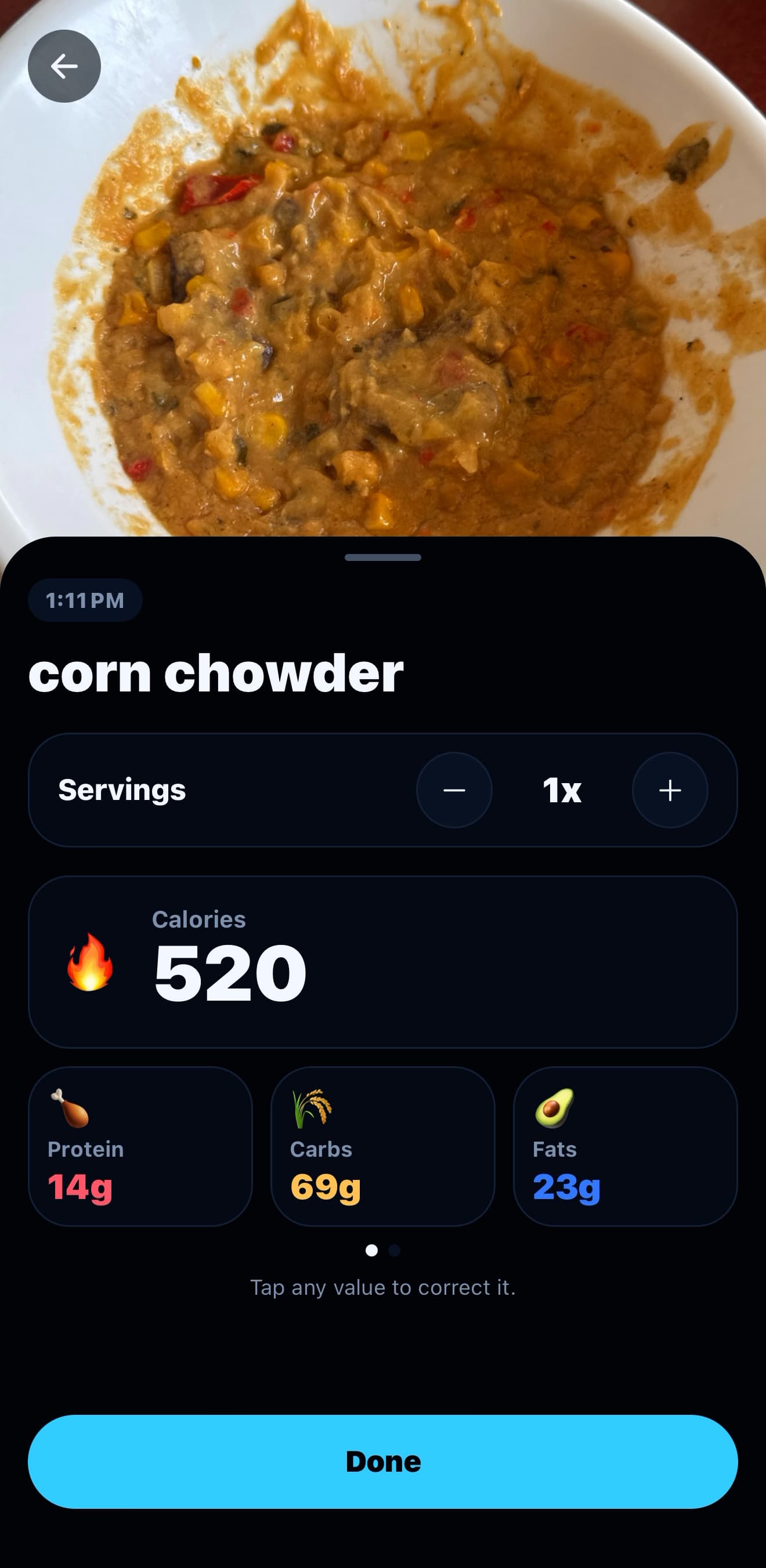 FitBound app meal photo scan result showing a photographed bowl of corn chowder with estimated calories, protein, carbs, and fats, and a prompt that any value can be corrected
